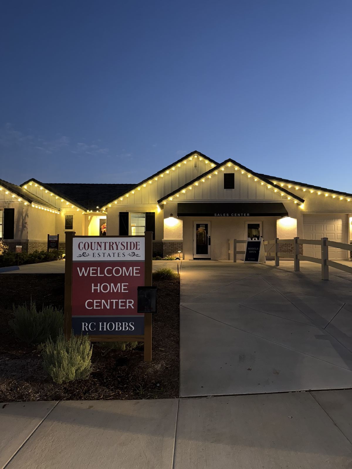 Model home sales center roofline — Christmas light installation in Riverside, CA