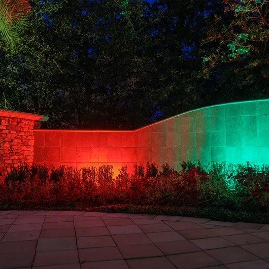 Landscape color wash lighting on garden wall
