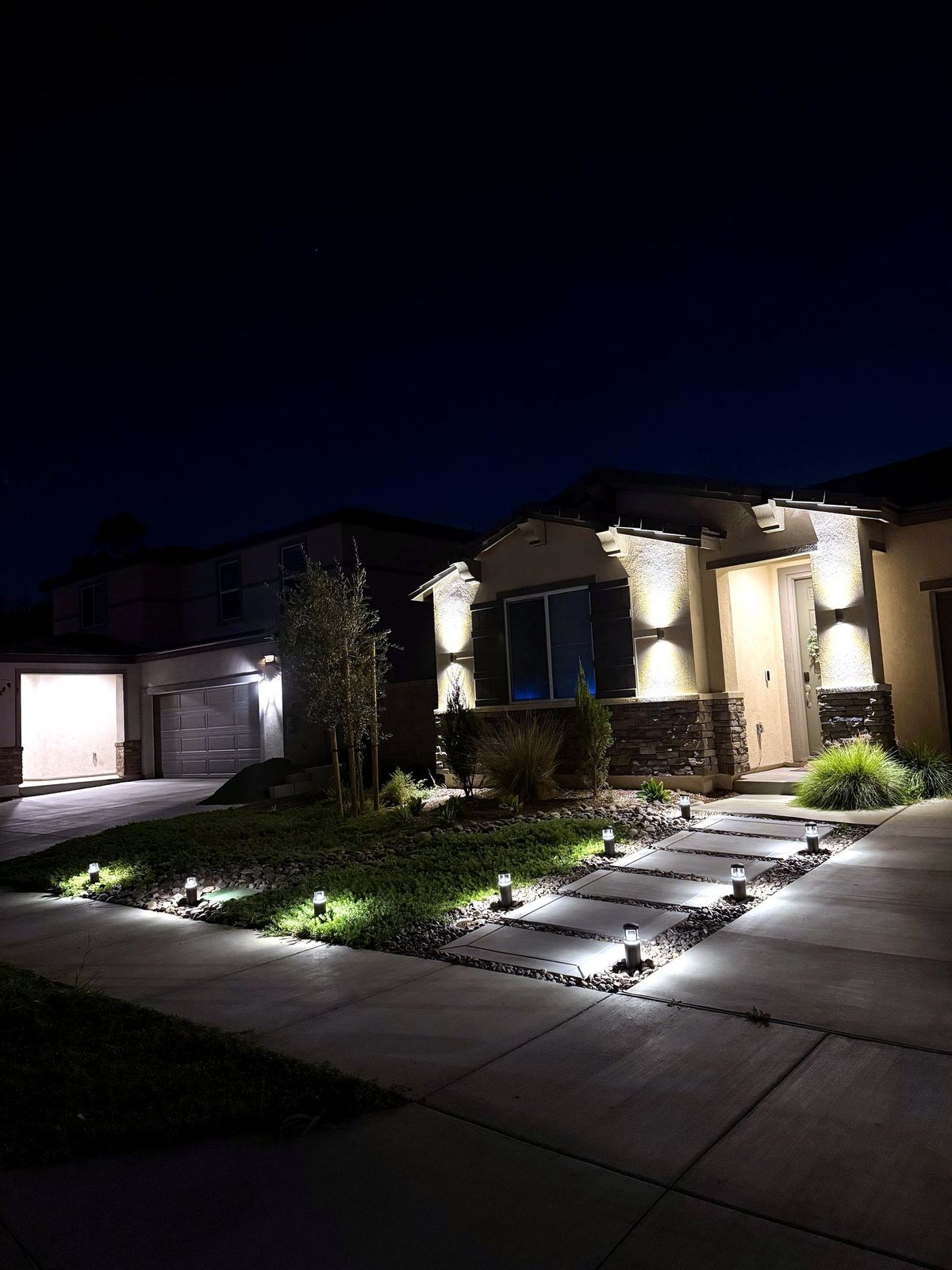 Pathway bollards entry night — landscape lighting install in Riverside, CA