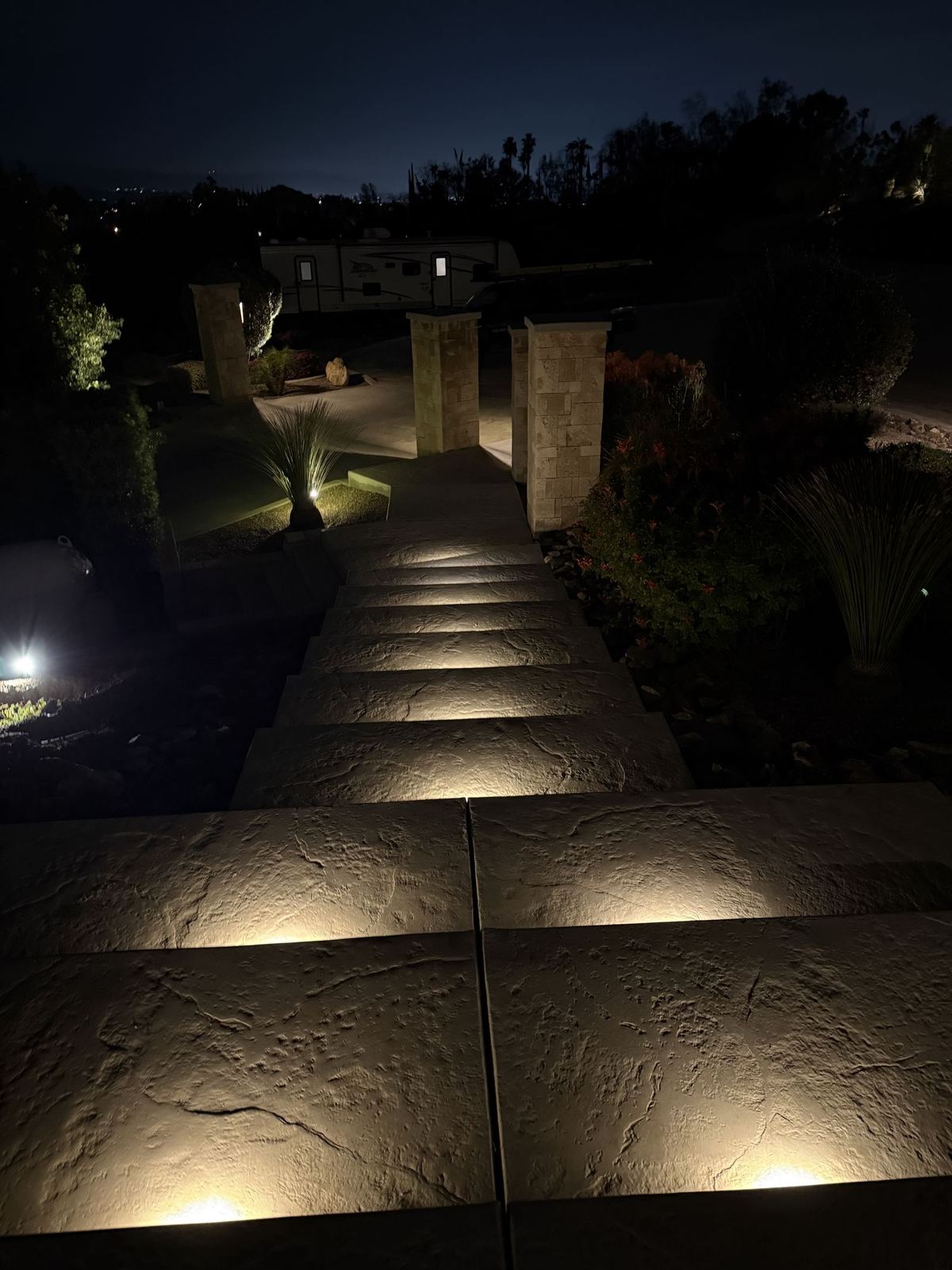 Landscape lighting on outdoor staircase steps