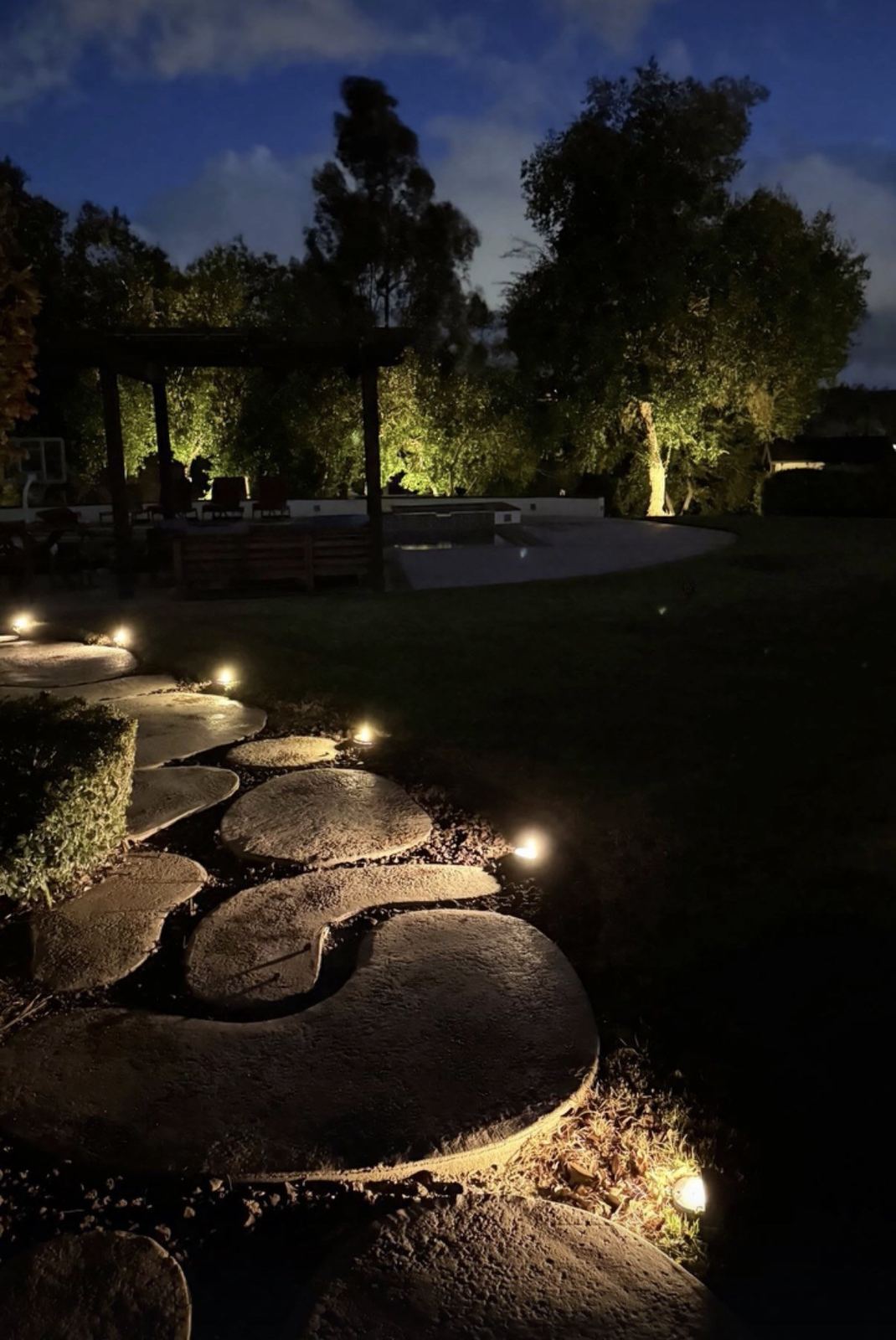 Stepping stone path pergola pool — landscape lighting install in Riverside, CA