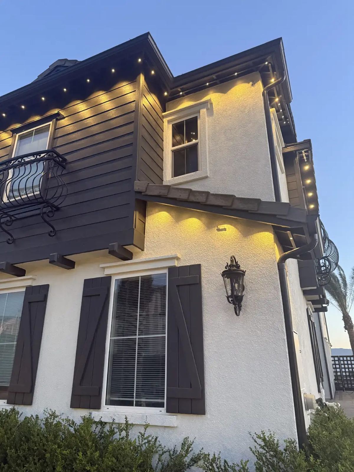 Craftsman warm white gable dusk — permanent LED roofline lighting in Riverside, CA