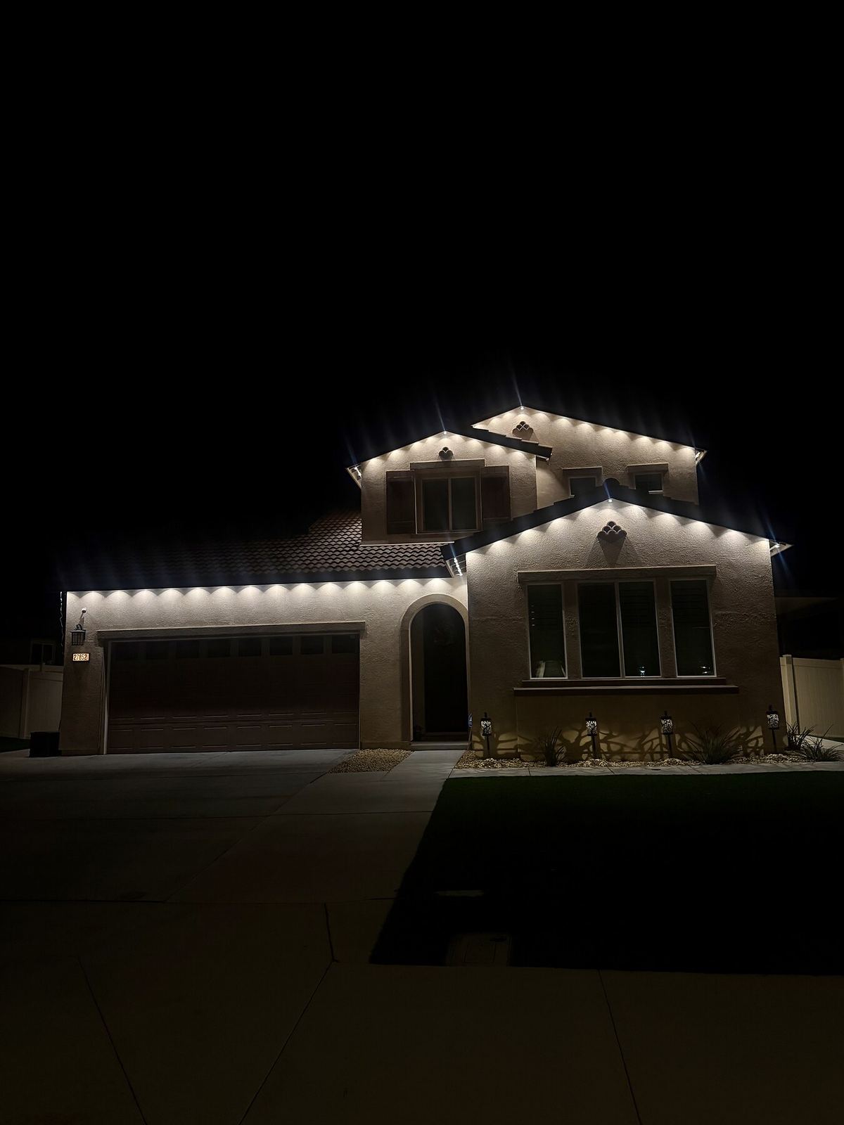 Estate warm white bollards — permanent LED roofline lighting in Riverside, CA