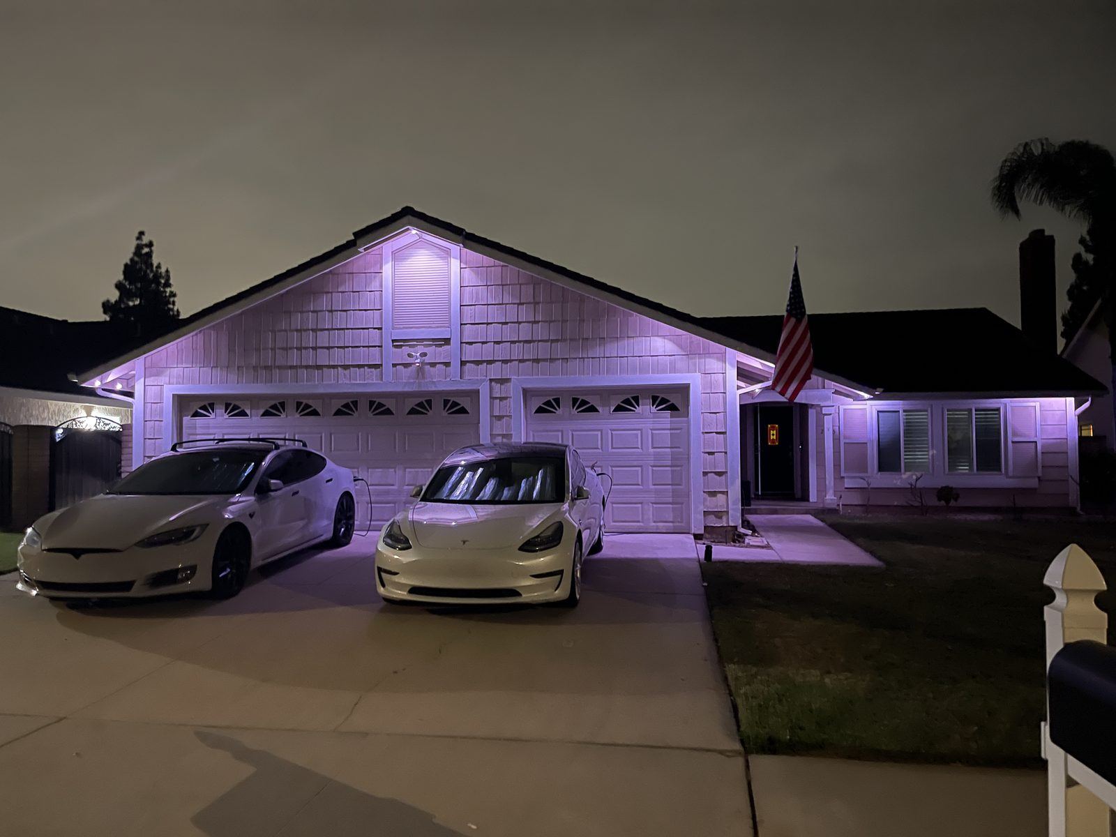 Ranch lavender tesla driveway night — permanent LED roofline lighting in Riverside, CA